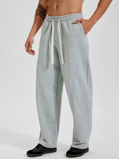 Men's Solid-Color Drawstring Pants with Curved Blade Design